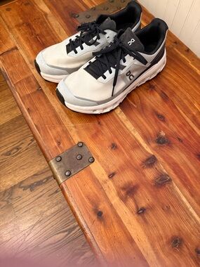 On Running Women’s White and Black Athletic Shoes